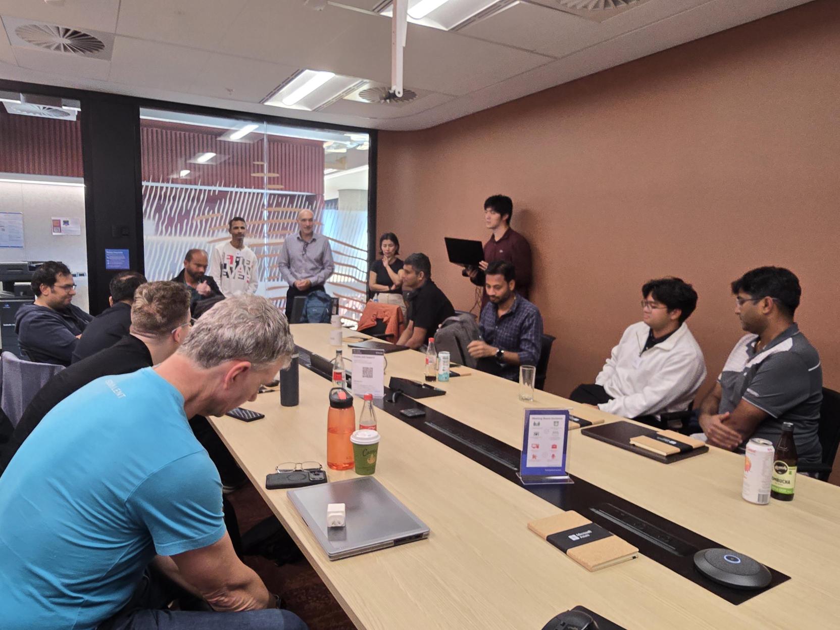 Co-design workshop in a boardroom with multiple engineers